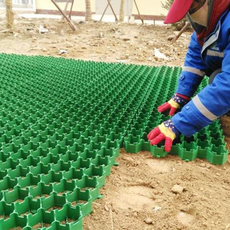 Wytrzymała kratka trawnikowa HDPE – przepuszczalna stabilizacja gruntu i stabilizator żwiru do podjazdów, parkingów i krajobrazu